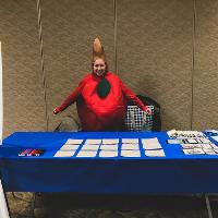 WAFERx student, Natalie Sturm, dressed as an enthusiastic Red Delicious, helped at the apple tasting booth--where people could sample different types of apples.